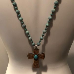 Long beaded necklace with cross